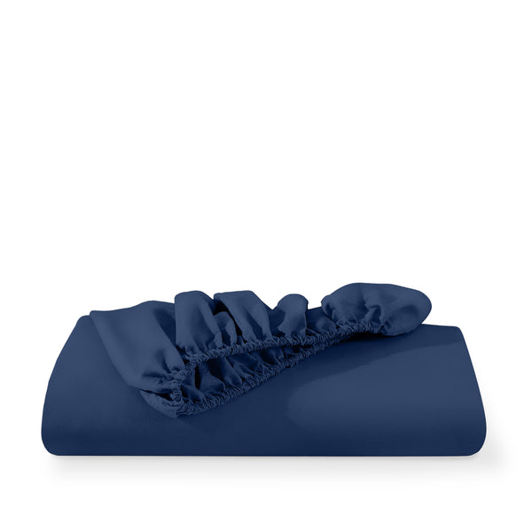 Microfiber fitted sheet folded with a white background
