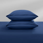Two pillowcases on top of a bed