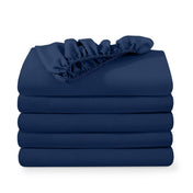 5 ultra soft fitted sheets folded and stacked