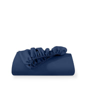 Dark blue fitted sheet on a white background