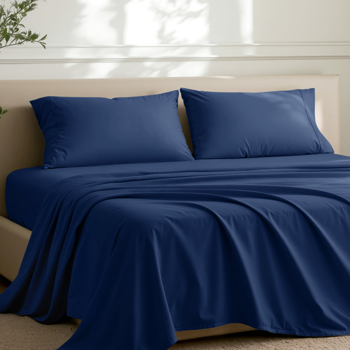 2 pillowcases on pillows on a nicely made bed