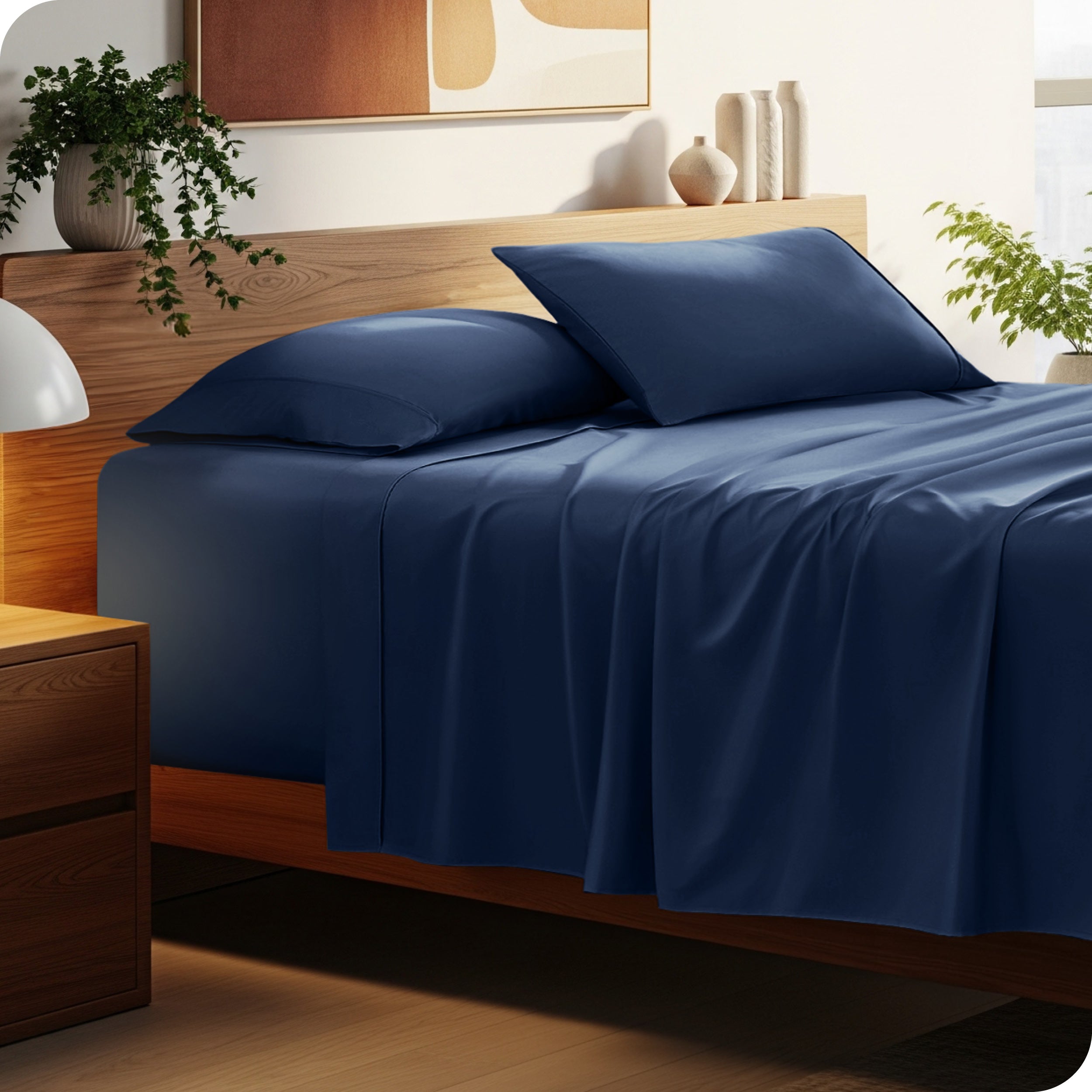 Bed with microfiber bedding and wooden headboard in a bedroom setting