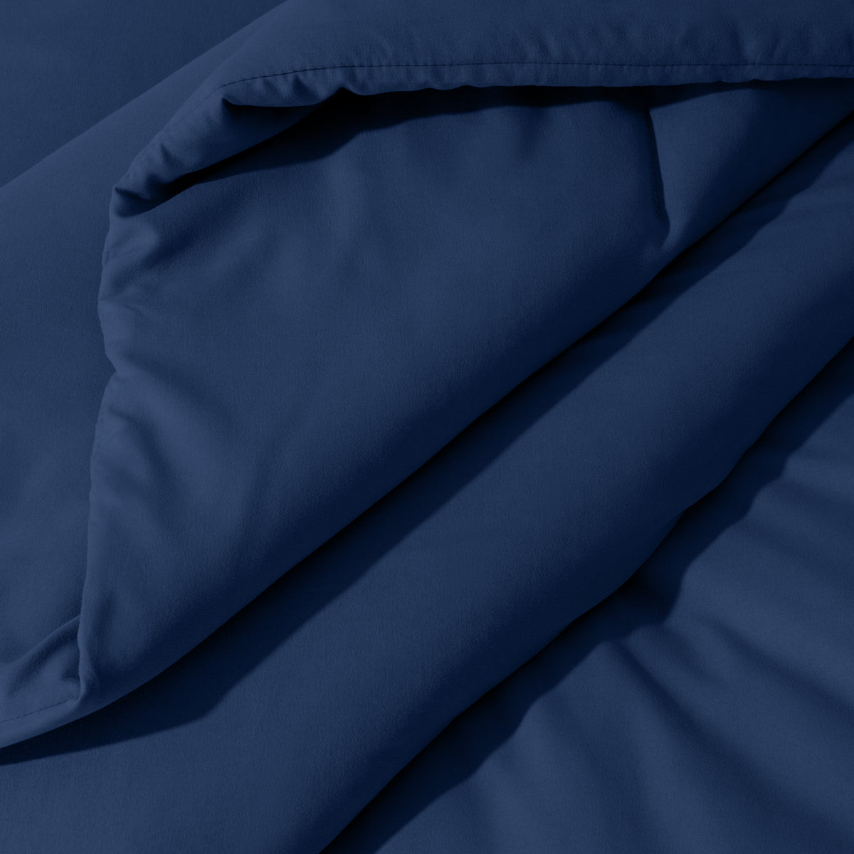 Close-up of comforter on a bed