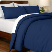 An angled view of a comforter set on a bed