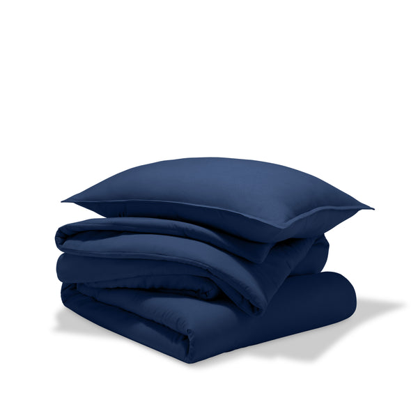 A comforter set folded and stacked