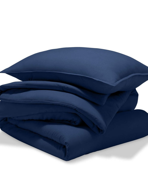 A comforter set folded and stacked