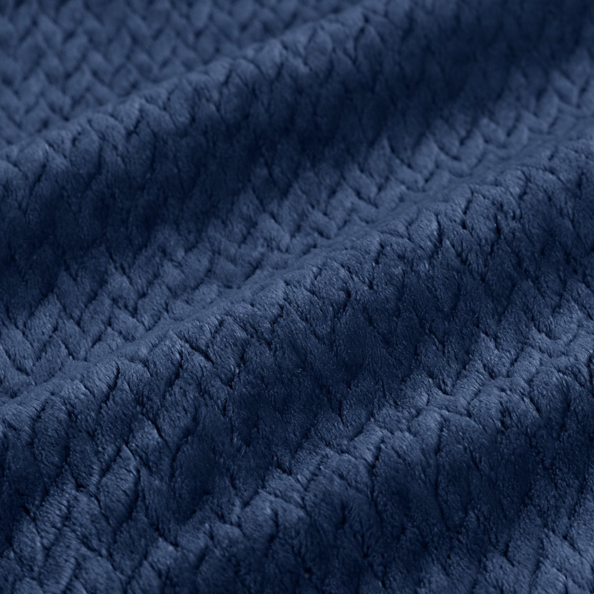 Close-up of chevron textured blanket
