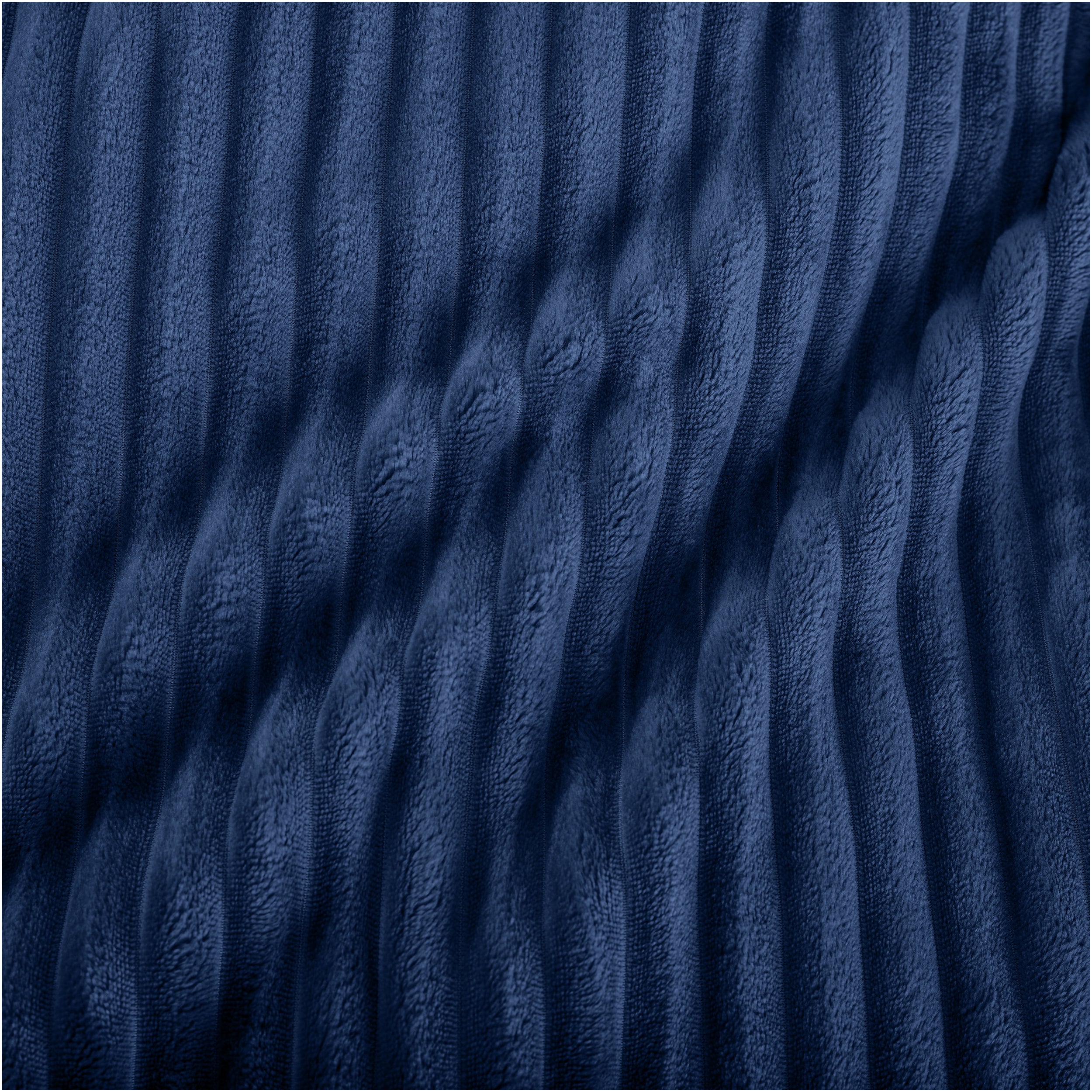 Close up of microplush ribbed textured blanket