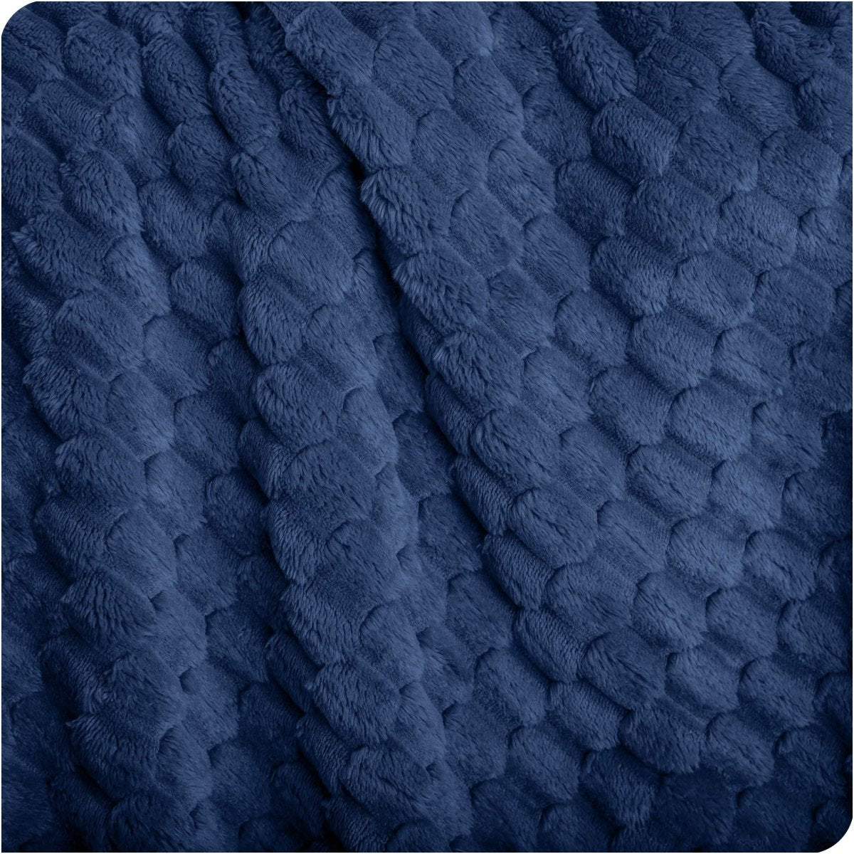 Close up of microplush waffle textured blanket