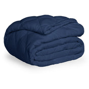 A blue quilted mattress pad