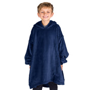 A boy wearing a blanket made of microplush, showcasing comfort and warmth.