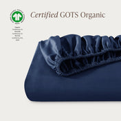 Certified GOTS Organic fitted sheet on a light gray background