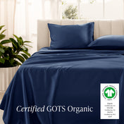 Bed with sateen bedding and pillowcases, featuring a GOTS Organic certification label.
