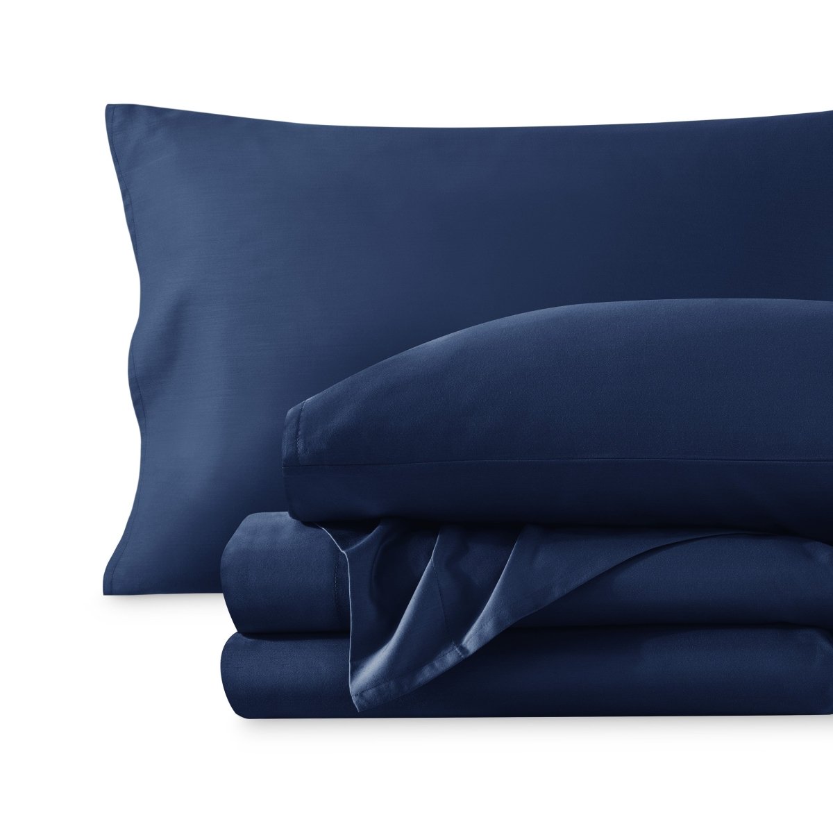 A sateen sheet set folded and stacked on a white background.