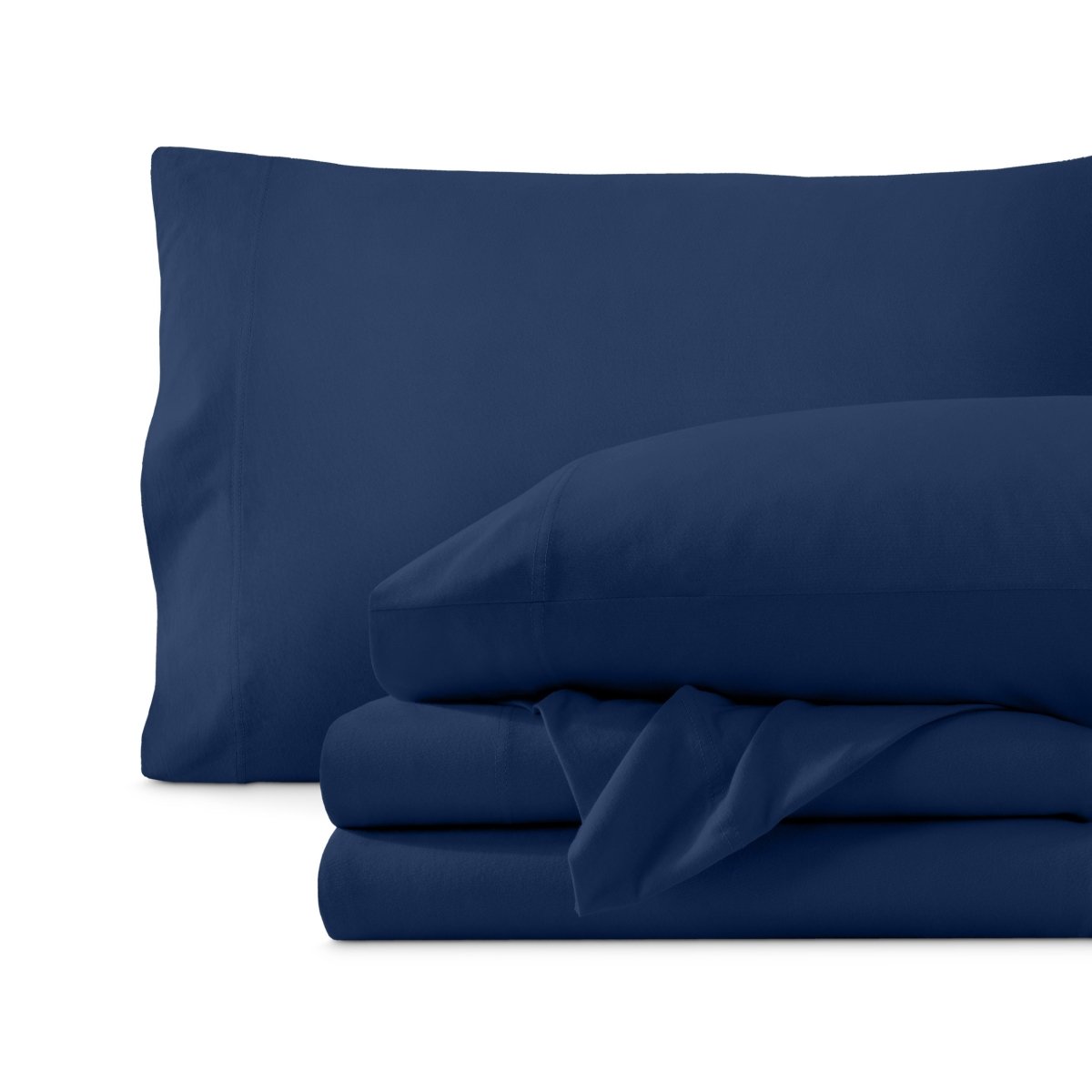 Set of organic cotton jersey sheets on a white background