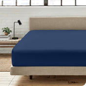 Modern bedroom with a fitted sheet which fits deep mattresses up to 15 inches