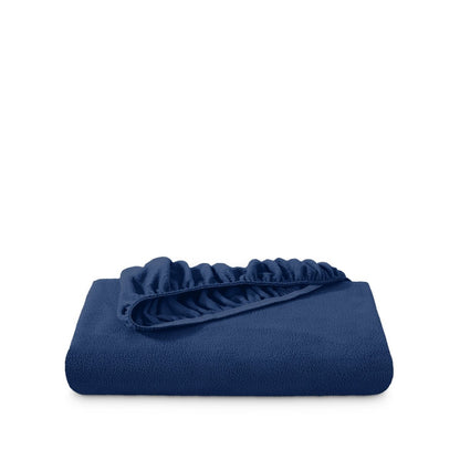 Polar fleece fitted sheet folded on a white background