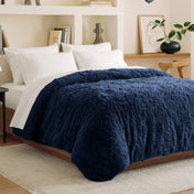 Shaggy duvet cover on a bed in a bedroom setting with shelves and decor.