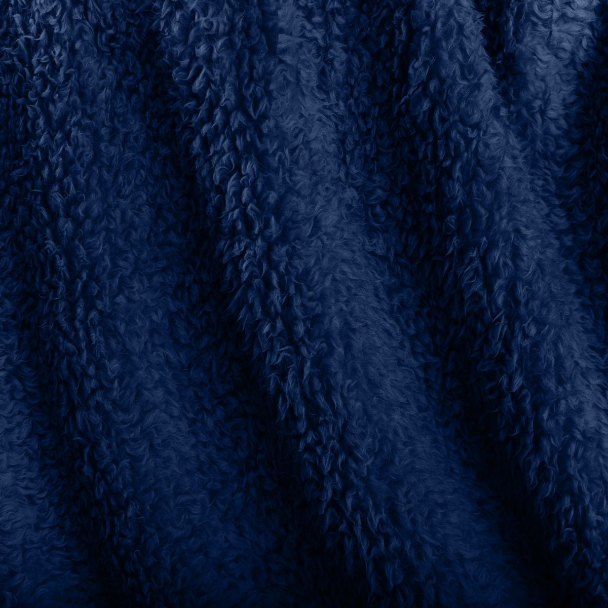 Close-up of textured faux shearling blanket