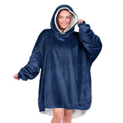 An adult with a hooded wearable blanket on