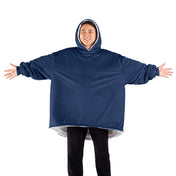 An adult with a wearable blanket on