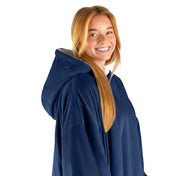 An adult with a hooded wearable blanket on