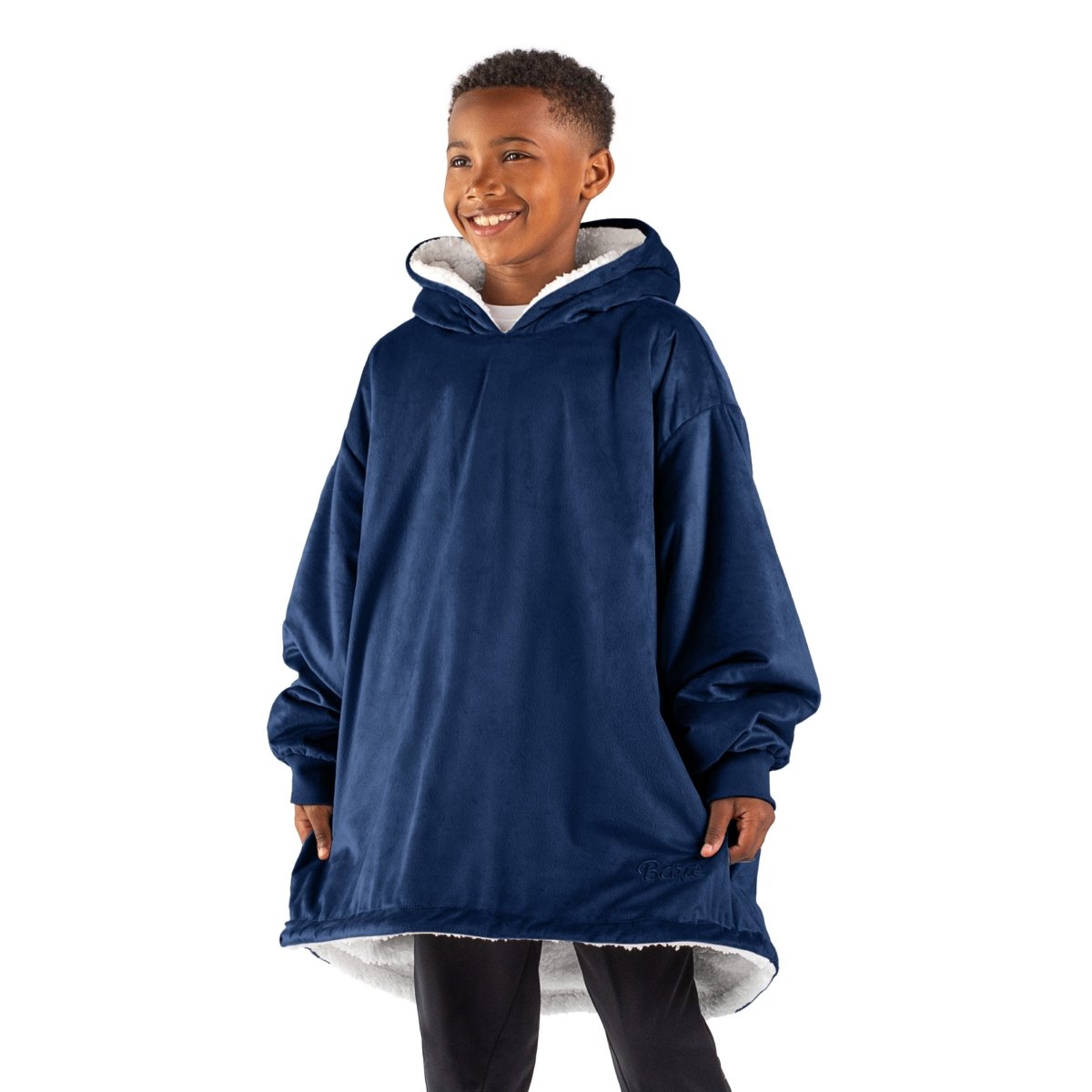A child with a sherpa wearable blanket on