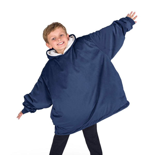 A child with a sherpa wearable blanket on