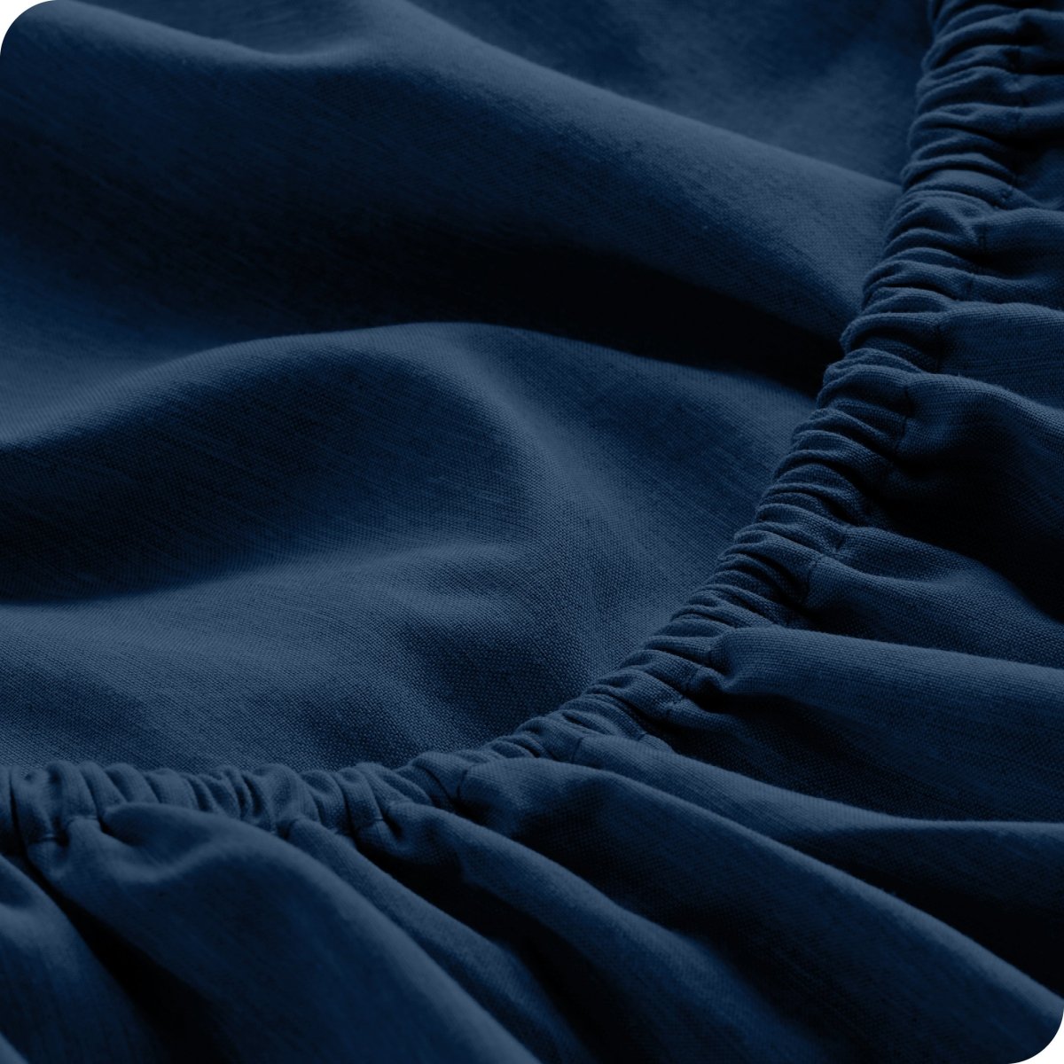 Close-up of fitted sheet with elastic edge