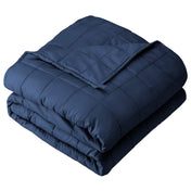 A folded cotton weighted blanket with a white background