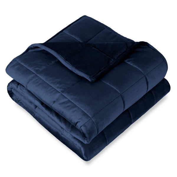A folded minky weighted blanket with a white background