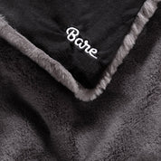 Faux fur blanket with Bare logo