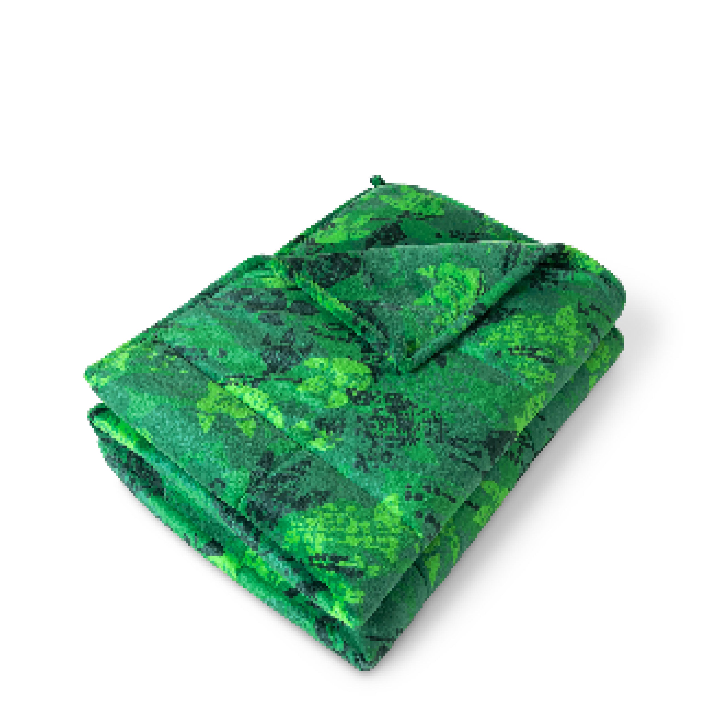 A minky weighted blanket folded neatly on a white background.