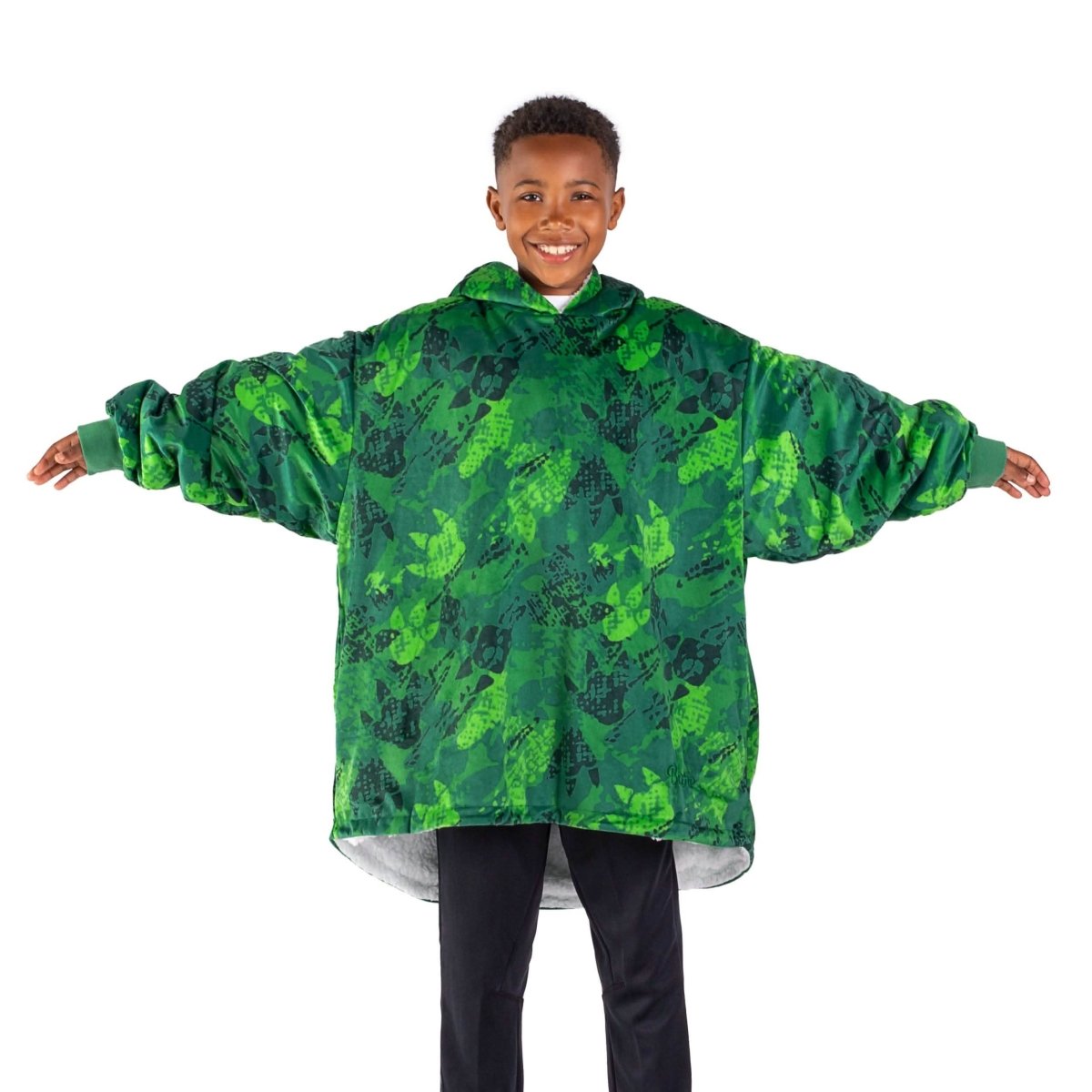 A child with a sherpa wearable blanket on