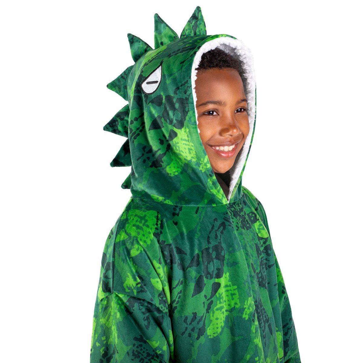 A child with a sherpa wearable blanket on