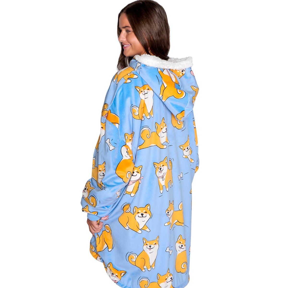 Person wearing a hooded blanket on a white background