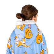 A child with a sherpa wearable blanket on