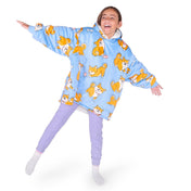 A child wearing a hooded blanket