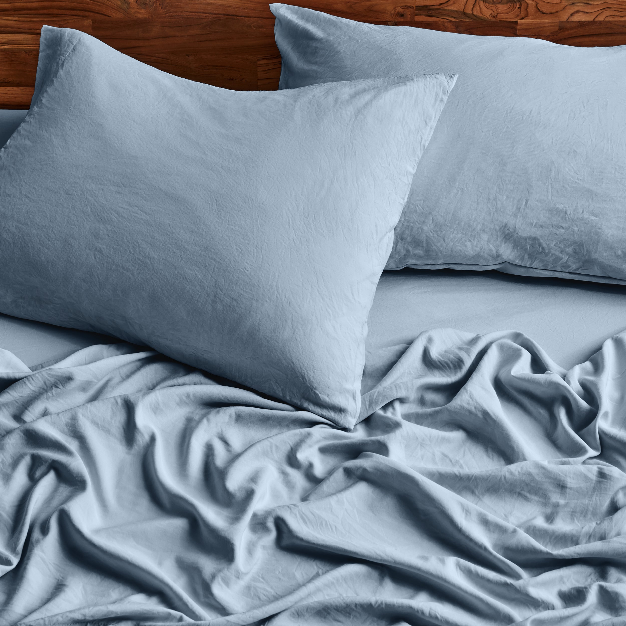 Close-up of sheets and pillowcases on a bed