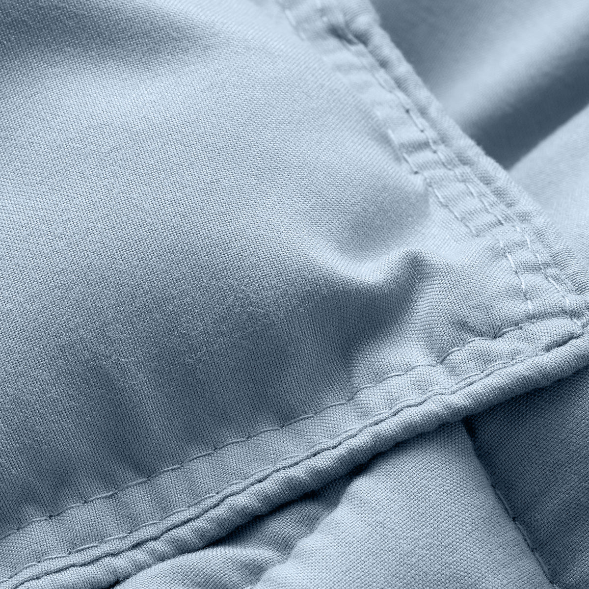 Close-up of comforter fabric with stitching detail