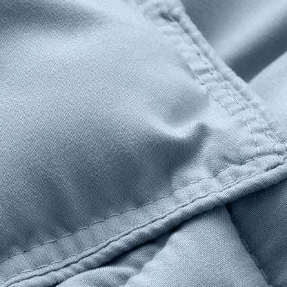 Close-up of comforter fabric with stitching detail