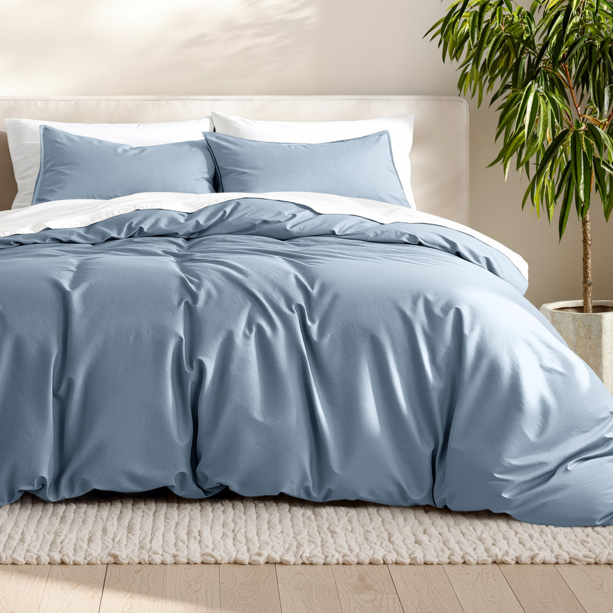 Microfiber bedding set on a bed with a neutral background