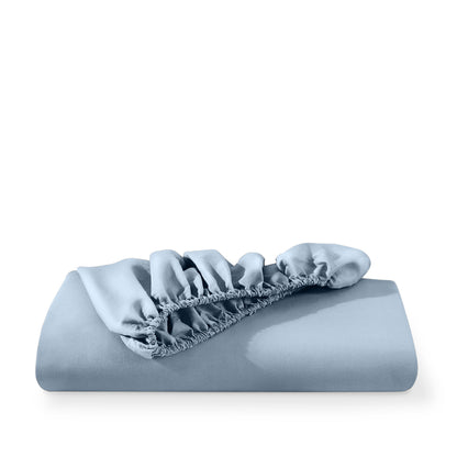 Microfiber fitted sheet folded with a white background