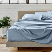 A modern bedroom with microfiber sheets on the mattress