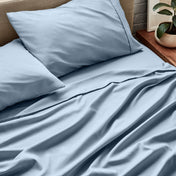 Close up of ultra-soft sheets on a bed