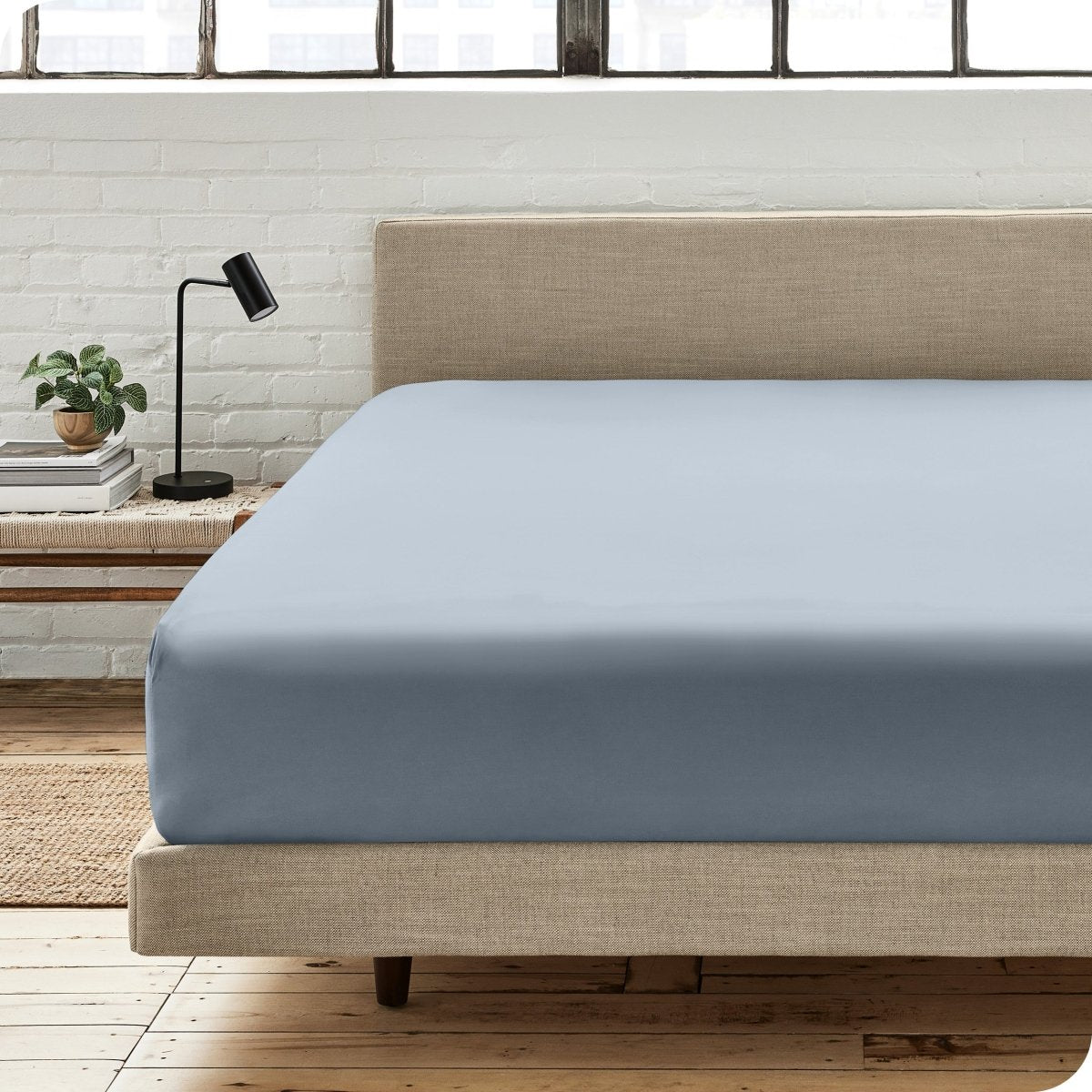 Modern bedroom with a fitted sheet which fits deep mattresses up to 15 inches