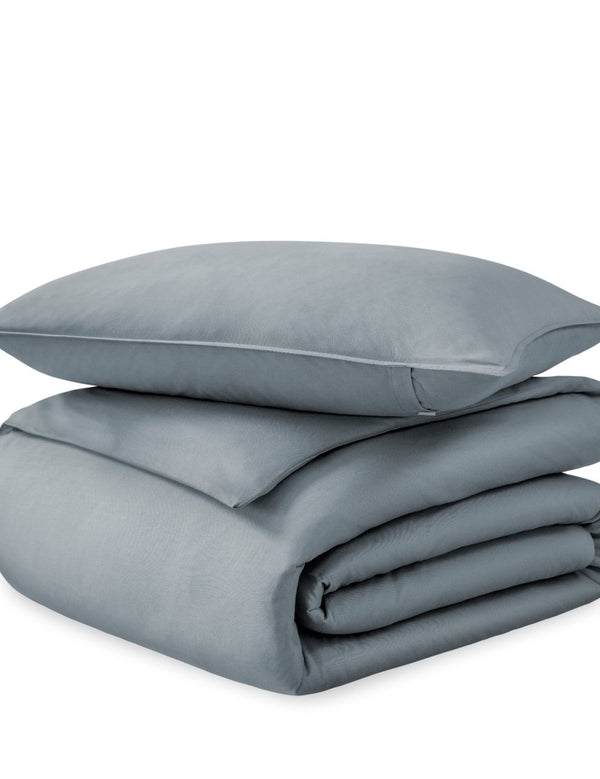 A sateen duvet set arranged in a stack