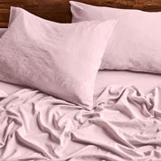 Close up of sheets and pillowcases on a bed