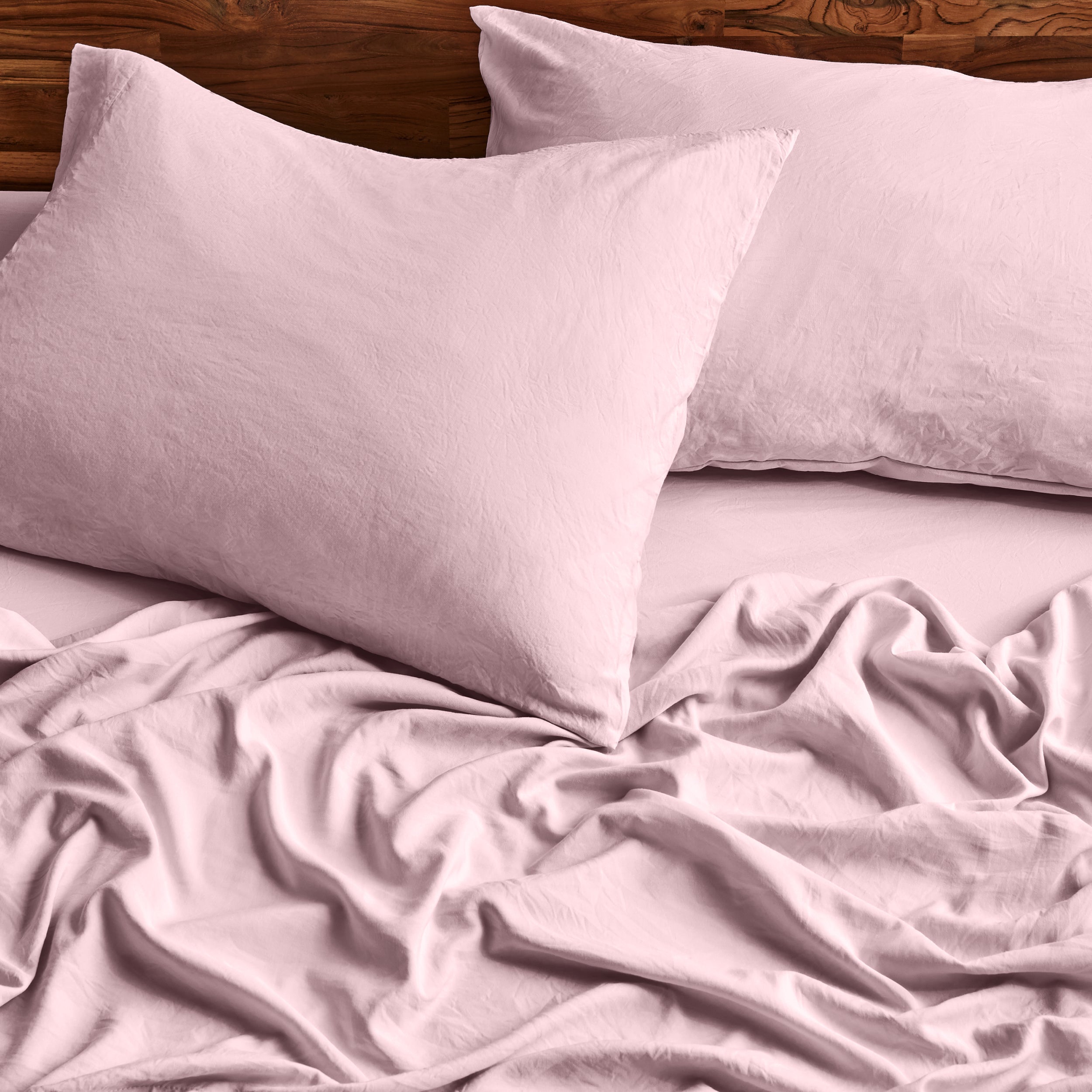Close-up of sheets and pillowcases on a bed