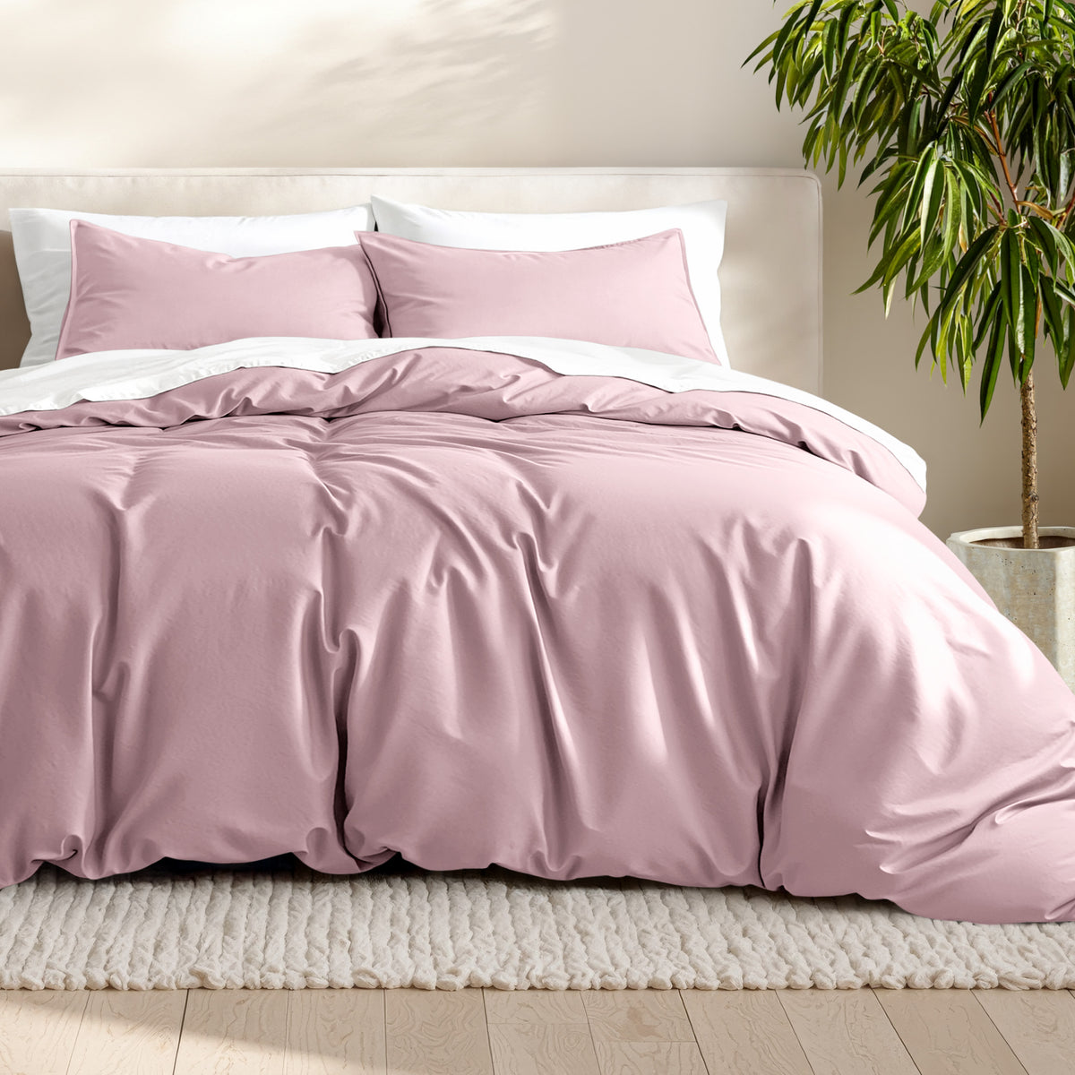 Microfiber bedding set on a bed with a neutral background